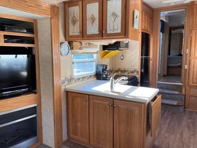 2005 Open Road RV- compliant to stay in ORPS. Lot 1066 sits a on Outdoor Resorts/Palm Springs in California - for sale on GolfHomes.com, golf home, golf lot