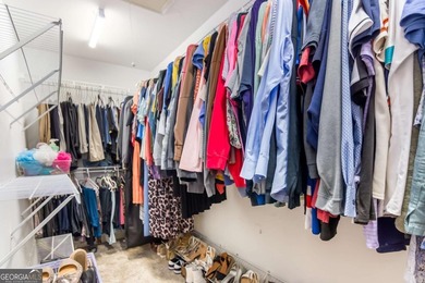 Rare Opportunity: This home offers an assumable 2.5% loan for on Towne Lake Hills Golf Club in Georgia - for sale on GolfHomes.com, golf home, golf lot