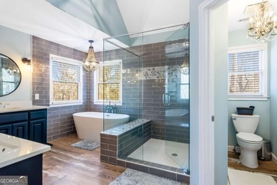 Rare Opportunity: This home offers an assumable 2.5% loan for on Towne Lake Hills Golf Club in Georgia - for sale on GolfHomes.com, golf home, golf lot