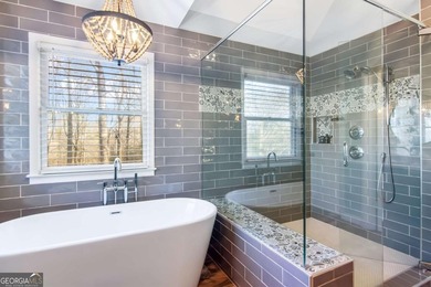 Rare Opportunity: This home offers an assumable 2.5% loan for on Towne Lake Hills Golf Club in Georgia - for sale on GolfHomes.com, golf home, golf lot