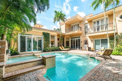 This stunning and meticulously maintained two-story courtyard on Country Club At Mirasol in Florida - for sale on GolfHomes.com, golf home, golf lot