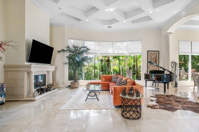This stunning and meticulously maintained two-story courtyard on Country Club At Mirasol in Florida - for sale on GolfHomes.com, golf home, golf lot