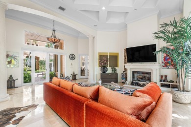 This stunning and meticulously maintained two-story courtyard on Country Club At Mirasol in Florida - for sale on GolfHomes.com, golf home, golf lot