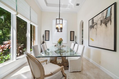 This stunning and meticulously maintained two-story courtyard on Country Club At Mirasol in Florida - for sale on GolfHomes.com, golf home, golf lot