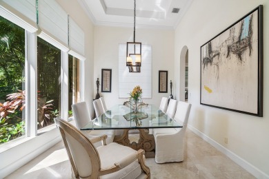 This stunning and meticulously maintained two-story courtyard on Country Club At Mirasol in Florida - for sale on GolfHomes.com, golf home, golf lot