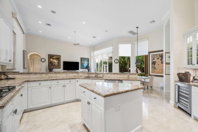 This stunning and meticulously maintained two-story courtyard on Country Club At Mirasol in Florida - for sale on GolfHomes.com, golf home, golf lot