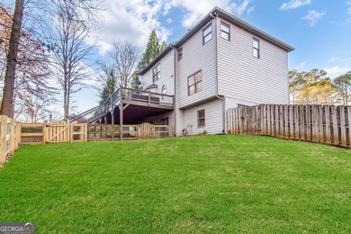 Rare Opportunity: This home offers an assumable 2.5% loan for on Towne Lake Hills Golf Club in Georgia - for sale on GolfHomes.com, golf home, golf lot