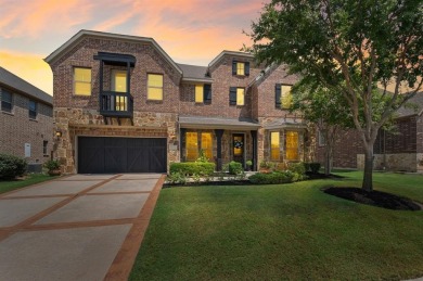 Tucked inside a quiet gated community just steps from Lake on The Tribute At the Colony in Texas - for sale on GolfHomes.com, golf home, golf lot