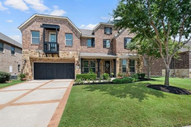 Tucked inside a quiet gated community just steps from Lake on The Tribute At the Colony in Texas - for sale on GolfHomes.com, golf home, golf lot