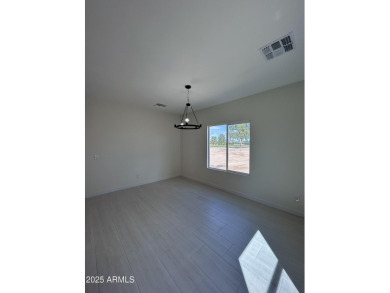BRAND NEW HOME on a spacious lot with a large driveway, block on Arizona City Golf Club in Arizona - for sale on GolfHomes.com, golf home, golf lot