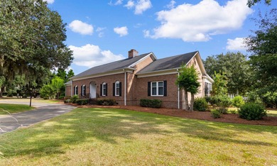 Welcome to this elegant and spacious traditional home nestled in on Wedgefield Plantation Golf Club in South Carolina - for sale on GolfHomes.com, golf home, golf lot