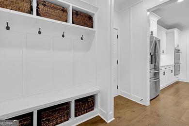 Experience luxury living within one of Middle Georgia's premier on The Club River Forest in Georgia - for sale on GolfHomes.com, golf home, golf lot