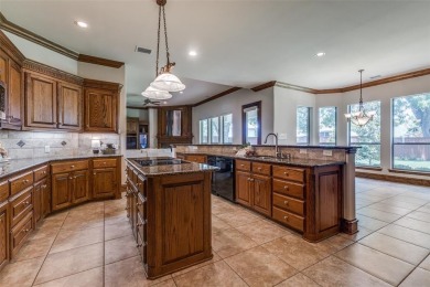 Welcome to this elegant home in the exclusive gated community of on Firewheel Golf Park in Texas - for sale on GolfHomes.com, golf home, golf lot