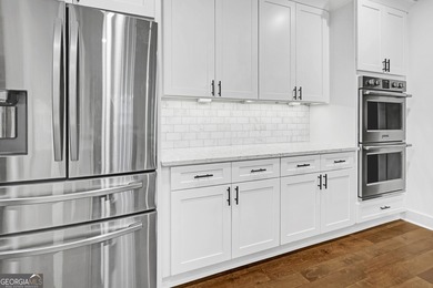 Experience luxury living within one of Middle Georgia's premier on The Club River Forest in Georgia - for sale on GolfHomes.com, golf home, golf lot