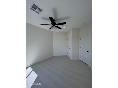 BRAND NEW HOME on a spacious lot with a large driveway, block on Arizona City Golf Club in Arizona - for sale on GolfHomes.com, golf home, golf lot