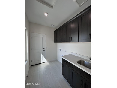 BRAND NEW HOME on a spacious lot with a large driveway, block on Arizona City Golf Club in Arizona - for sale on GolfHomes.com, golf home, golf lot