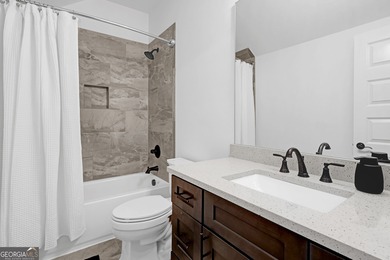 Experience luxury living within one of Middle Georgia's premier on The Club River Forest in Georgia - for sale on GolfHomes.com, golf home, golf lot