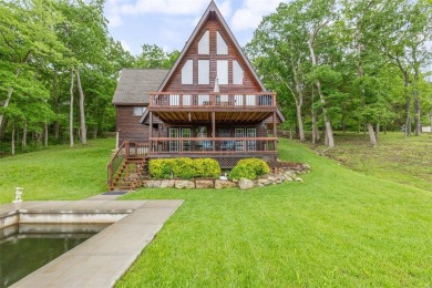 Welcome to your dream Lodge-like home nestled on a sprawling on Raintree Country Club in Missouri - for sale on GolfHomes.com, golf home, golf lot