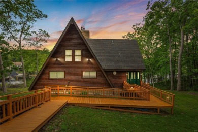 Welcome to your dream Lodge-like home nestled on a sprawling on Raintree Country Club in Missouri - for sale on GolfHomes.com, golf home, golf lot