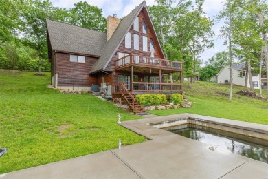 Welcome to your dream Lodge-like home nestled on a sprawling on Raintree Country Club in Missouri - for sale on GolfHomes.com, golf home, golf lot