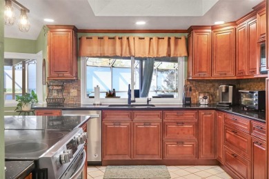 MORE BANG FOR THE BUCK HERE - This is now the home with the BEST on Palm Aire Country Club of Sarasota in Florida - for sale on GolfHomes.com, golf home, golf lot
