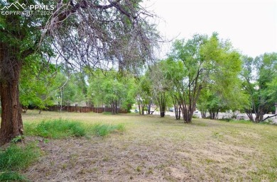 Outstanding treed lot in beautiful Valley Hi! Almost half an on Valley Hi Golf Course in Colorado - for sale on GolfHomes.com, golf home, golf lot