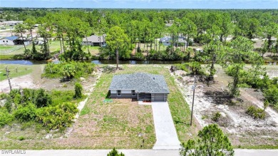 BRAND NEW CONSTRUCTION ON A FRESHWATER CANAL LOT WITH A GREAT on Mirror Lakes Golf Club in Florida - for sale on GolfHomes.com, golf home, golf lot