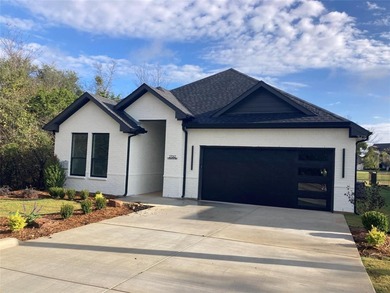 Discover elegance and modern living in this newly constructed on White Bluff Resort - New Course in Texas - for sale on GolfHomes.com, golf home, golf lot