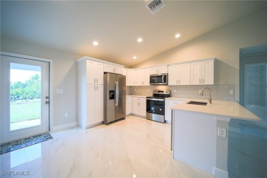 BRAND NEW CONSTRUCTION ON A FRESHWATER CANAL LOT WITH A GREAT on Mirror Lakes Golf Club in Florida - for sale on GolfHomes.com, golf home, golf lot