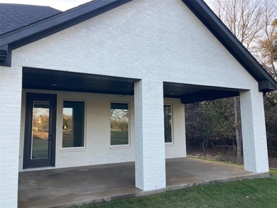 Discover elegance and modern living in this newly constructed on White Bluff Resort - New Course in Texas - for sale on GolfHomes.com, golf home, golf lot