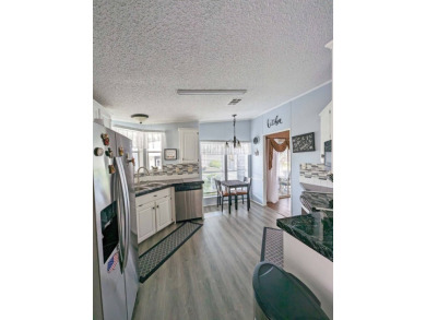 2 Bedroom | 2 Bath | 1,316 sq ft | $117,900    Lot 477 in Four on Four Lakes Golf Club in Florida - for sale on GolfHomes.com, golf home, golf lot