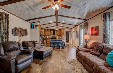 Sitting on three lots.  This Immaculate 3-bedroom, 2-bath home on Mountain Ranch Golf Club in Arkansas - for sale on GolfHomes.com, golf home, golf lot