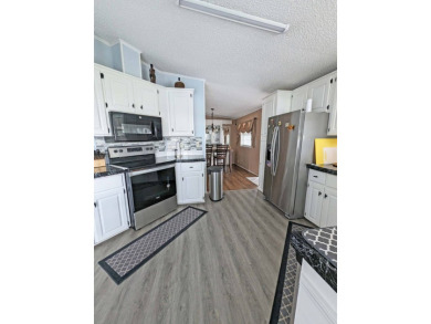 2 Bedroom | 2 Bath | 1,316 sq ft | $117,900    Lot 477 in Four on Four Lakes Golf Club in Florida - for sale on GolfHomes.com, golf home, golf lot