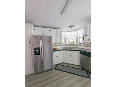 2 Bedroom | 2 Bath | 1,316 sq ft | $117,900    Lot 477 in Four on Four Lakes Golf Club in Florida - for sale on GolfHomes.com, golf home, golf lot