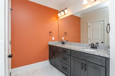 Peaceful living meets modern comfort in this stunning Canton on The Fairways at Laurel Canyon in Georgia - for sale on GolfHomes.com, golf home, golf lot