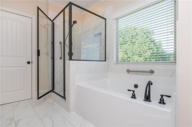 Peaceful living meets modern comfort in this stunning Canton on The Fairways at Laurel Canyon in Georgia - for sale on GolfHomes.com, golf home, golf lot