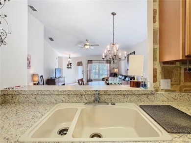 Charming Chardonnay model featuring 2 bedrooms and 1 bath with on Stonegate Golf Club in Florida - for sale on GolfHomes.com, golf home, golf lot