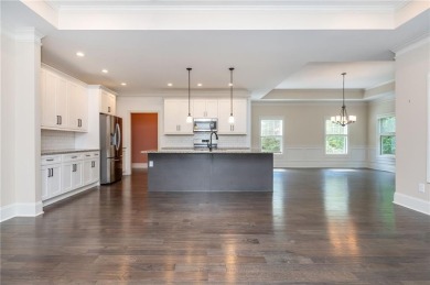 Peaceful living meets modern comfort in this stunning Canton on The Fairways at Laurel Canyon in Georgia - for sale on GolfHomes.com, golf home, golf lot