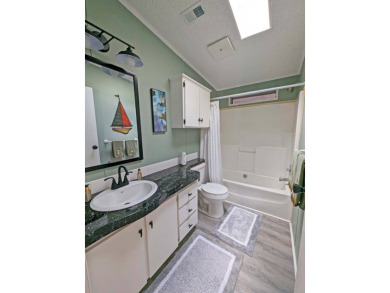 2 Bedroom | 2 Bath | 1,316 sq ft | $117,900    Lot 477 in Four on Four Lakes Golf Club in Florida - for sale on GolfHomes.com, golf home, golf lot