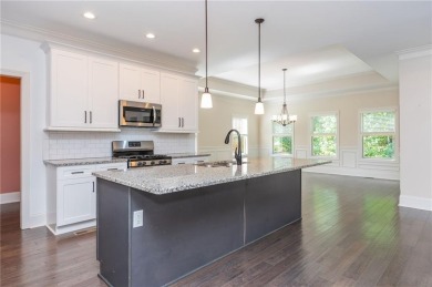 Peaceful living meets modern comfort in this stunning Canton on The Fairways at Laurel Canyon in Georgia - for sale on GolfHomes.com, golf home, golf lot