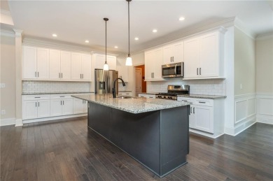 Peaceful living meets modern comfort in this stunning Canton on The Fairways at Laurel Canyon in Georgia - for sale on GolfHomes.com, golf home, golf lot