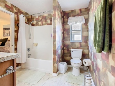 Charming Chardonnay model featuring 2 bedrooms and 1 bath with on Stonegate Golf Club in Florida - for sale on GolfHomes.com, golf home, golf lot