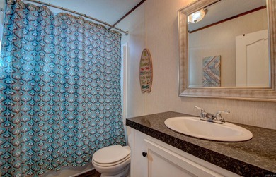 Sitting on three lots.  This Immaculate 3-bedroom, 2-bath home on Mountain Ranch Golf Club in Arkansas - for sale on GolfHomes.com, golf home, golf lot
