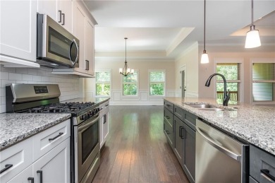 Peaceful living meets modern comfort in this stunning Canton on The Fairways at Laurel Canyon in Georgia - for sale on GolfHomes.com, golf home, golf lot