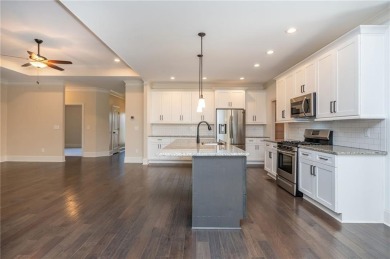 Peaceful living meets modern comfort in this stunning Canton on The Fairways at Laurel Canyon in Georgia - for sale on GolfHomes.com, golf home, golf lot