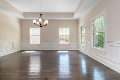 Peaceful living meets modern comfort in this stunning Canton on The Fairways at Laurel Canyon in Georgia - for sale on GolfHomes.com, golf home, golf lot