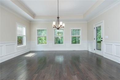Peaceful living meets modern comfort in this stunning Canton on The Fairways at Laurel Canyon in Georgia - for sale on GolfHomes.com, golf home, golf lot