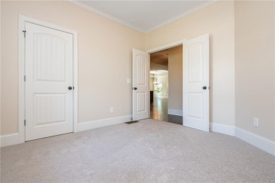 Peaceful living meets modern comfort in this stunning Canton on The Fairways at Laurel Canyon in Georgia - for sale on GolfHomes.com, golf home, golf lot