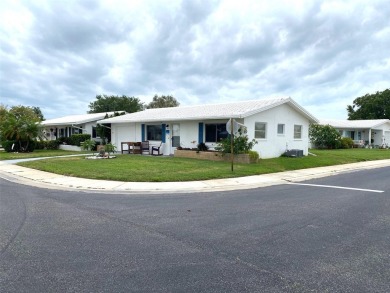 This 2 bedroom 1.5 bath home is located in the 55+ COMMUNITY of on Mainlands Golf Club in Florida - for sale on GolfHomes.com, golf home, golf lot