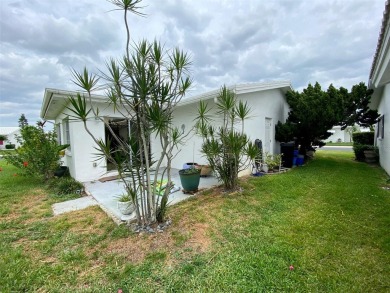 This 2 bedroom 1.5 bath home is located in the 55+ COMMUNITY of on Mainlands Golf Club in Florida - for sale on GolfHomes.com, golf home, golf lot